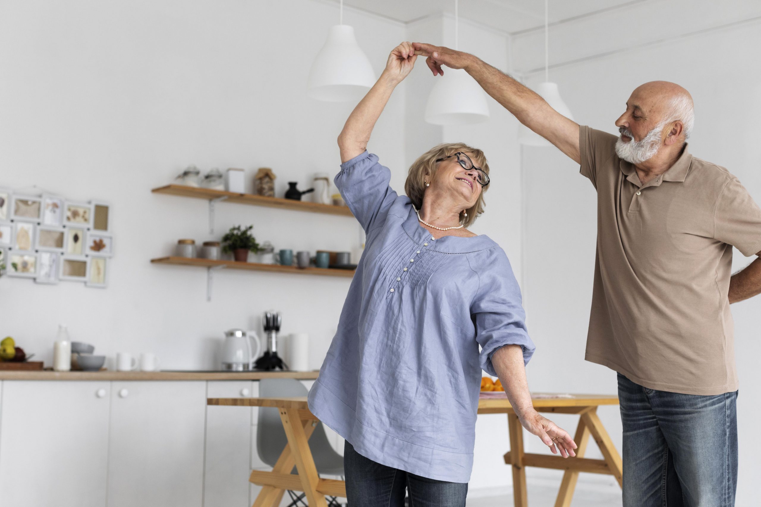 medium-shot-couple-dancing-together-scaled